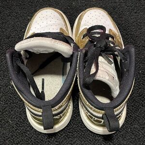Kids Gold and White Nike Sneakers